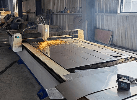 Aluminum and stainless steel metal cladding on insulated pipe rack — industrial plant environment