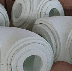 CNC milled small elbow sections — precision 3D cutting for complex pipe geometry