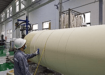 Online machine trimming of foam to precise dimensions after foaming