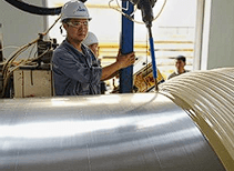 Continuous seamless foam injection around the pipe — factory controlled process